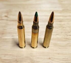 Loaded .223 Remington and 5.56 NATO ammunition (L to R) including FMJ, green tip steel core penetrator, and BTHP match
