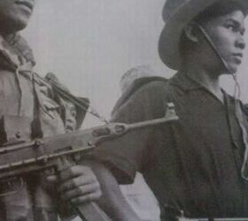 vietnam s converted submachine gun the k 50m, K 50M and what looks like a Sten on the bottom right Photo credit unknown