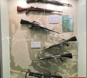 the xm148 americas early under barrel grenade launchers in vietnam, Captured US weapons display Ho Chi Minh City One interesting weapon is the M14E2 M14A1 which was a stopgap light machine gun during the war By Lynndon Schooler