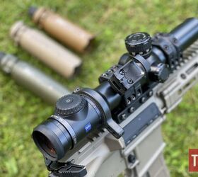 potd custom daniel defense with ase utra suppressors