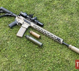 potd custom daniel defense with ase utra suppressors