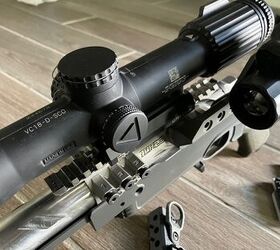 nor23 3d printing enabled natural bolt action evolution, Fully assembled action in NOR23 Blade 6 Prototype receiver with a 1X sight next to the magnified scope
