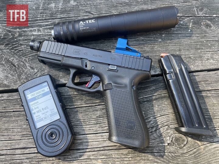 Glock 45 about to use the Mec-Gar magazine, Shield Sights Red Dot, A-TEC PMM-6 Pistol Suppressor and the Shooters Global SG Timer 2 - This Beeper is a Keeper.