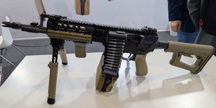 dsei 2025 fightlite showcase their new dfx amg 3 machine guns