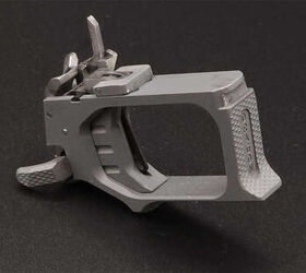 the quest for the low bore axis rideout arsenal dragon from the usa, The firearm the metal bar sticking up is the sear which has a large engagement surface with the linear hammer and releases it when the 2 5 3 0 lbs trigger pull with its own trigger safety depressed lowers it Notice that the ambidextrous mag catch is part of this group as well only the slide stop release sits in the grip frame this will help in making customization straightforward