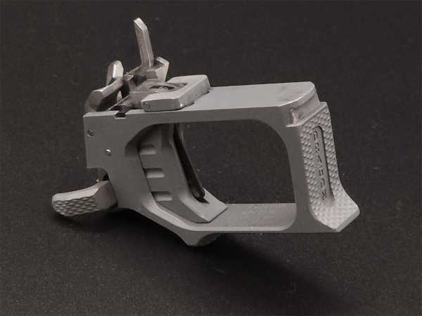 the quest for the low bore axis rideout arsenal dragon from the usa, The firearm the metal bar sticking up is the sear which has a large engagement surface with the linear hammer and releases it when the 2 5 3 0 lbs trigger pull with its own trigger safety depressed lowers it Notice that the ambidextrous mag catch is part of this group as well only the slide stop release sits in the grip frame this will help in making customization straightforward