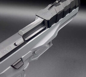 the quest for the low bore axis rideout arsenal dragon from the usa, View of the barrel bolt carrier and bolt within the frame notice the thumb rest gas pedal available on both sides