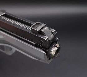 the quest for the low bore axis rideout arsenal dragon from the usa, View of the muzzle without the nose above the barrel sits the bolt with the lever that interfaces with the bolt carrier group