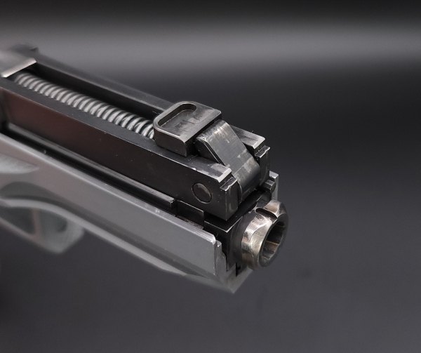 the quest for the low bore axis rideout arsenal dragon from the usa, View of the muzzle without the nose above the barrel sits the bolt with the lever that interfaces with the bolt carrier group