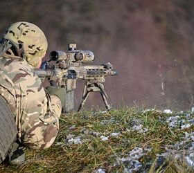 potd international sniper teams on the firing line, An Estonian sniper team member engages targets I presume this is the R20L MARS H LMT in 7 62mm with a rifle scope from Schmidt Bender