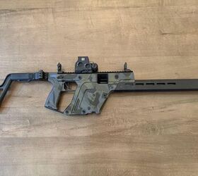 The KRISS Vector Gen 3 with optic and MBUS sights up. I was able to cowitness with my EOTECH, but results may vary with other optics.