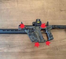 The Vector uses four takedown pins (pointed to by the red arrows) to disassemble that require no tools.