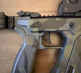 The pistol grip is capable of being changed out with comparable AR15 grips, and the bottom grip plate is completely removable to the user's preference.