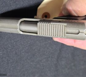 the rimfire report the elusive but cool 22lr amt backup, Photo Guns International