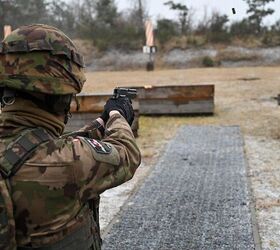 Swiss soldier firing a P75 at the range, 2025 (U.S. Army/Staff Sgt. Randis Monroe)