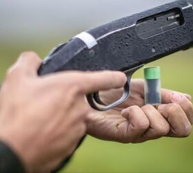 potd mossbergs military shotgun in full flash