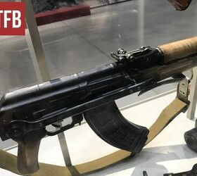 the soviet silenced tishina grenade launcher, AKMS with PBS 1 rear sight By Lynndon Schooler