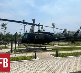 spinning death the gau 2 miniguns over vietnam, UH 1 in Hanoi Vietnam By Lynndon Schooler