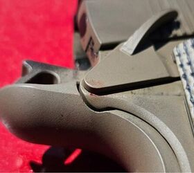 Blood on the right-side safety lever from the sharp corner - I rounded off that sharp edge using a file