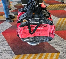 shot 2026 day 2 the people of shot show, The Swag Hound loves a free branded bag and filling it with more free branded items is the sole desire of some people