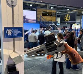 shot 2026 smith wesson metal frame pistols 360 buckhammer 1854