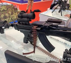 vietnams 7 62x39 negev the strl 7 62 lmg, STrL 7 62 with an RPD belt and 30 round AK magazine Photo credit Nguy n T ng Th Thi n