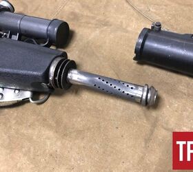 cold war shadows the vss vintorez and as val silent weapons, The can is removed showing the ported barrel the porting follows the grooves in the bore By Lynndon Schooler