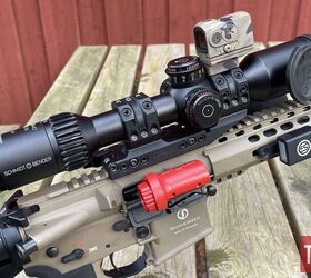 Schmeisser AR15 setup for DMR shooting, with a Schmidt & Bender 3-12x42 META (FFP) and an Aimpoint ACRO secondary. The red “thing” is a Riflekühl Barrel Cooler by MagnetoSpeed and the SG Pulse can be seen to the right.