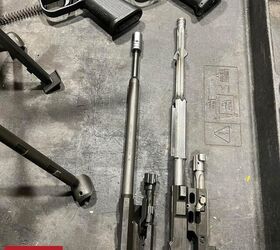 hks next gen twist on the fn minimi the mg43, FN bolt carrier group assembly next to the HK carrier By Lynndon Schooler