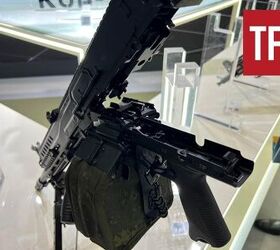 hidden in plain sight russias unidentified lmg, The unconventional feed tray assembly of the bottom feeder RPL 20 By Lynndon Schooler