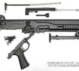 inside russia s rpl 20 machine gun, Disassembled RPL 20 late prototype note the bolt carrier and main spring assembly Photo credit Kalashnikov ru