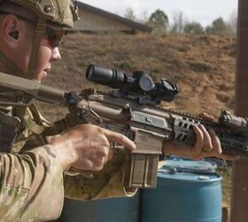 potd the xm8 carbine m7 rifle and the m250 automatic rifle