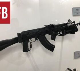 inside the ak 100 series, AK 103 with GP 34 By Lynndon Schooler