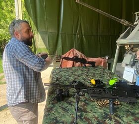 Vlad photographing Zastava's during a research trip to the range