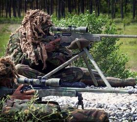 Royal Marines with L115A1 rifles.