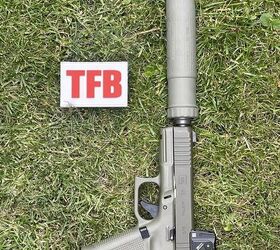 potd custom glock 45 mos hunter edition with b t titanium suppressor