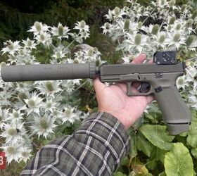 potd custom glock 45 mos hunter edition with b t titanium suppressor