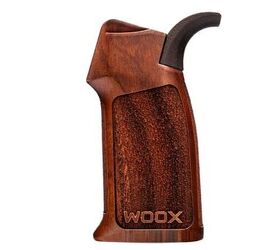 woox introduces new vigilante beavertail walnut grip