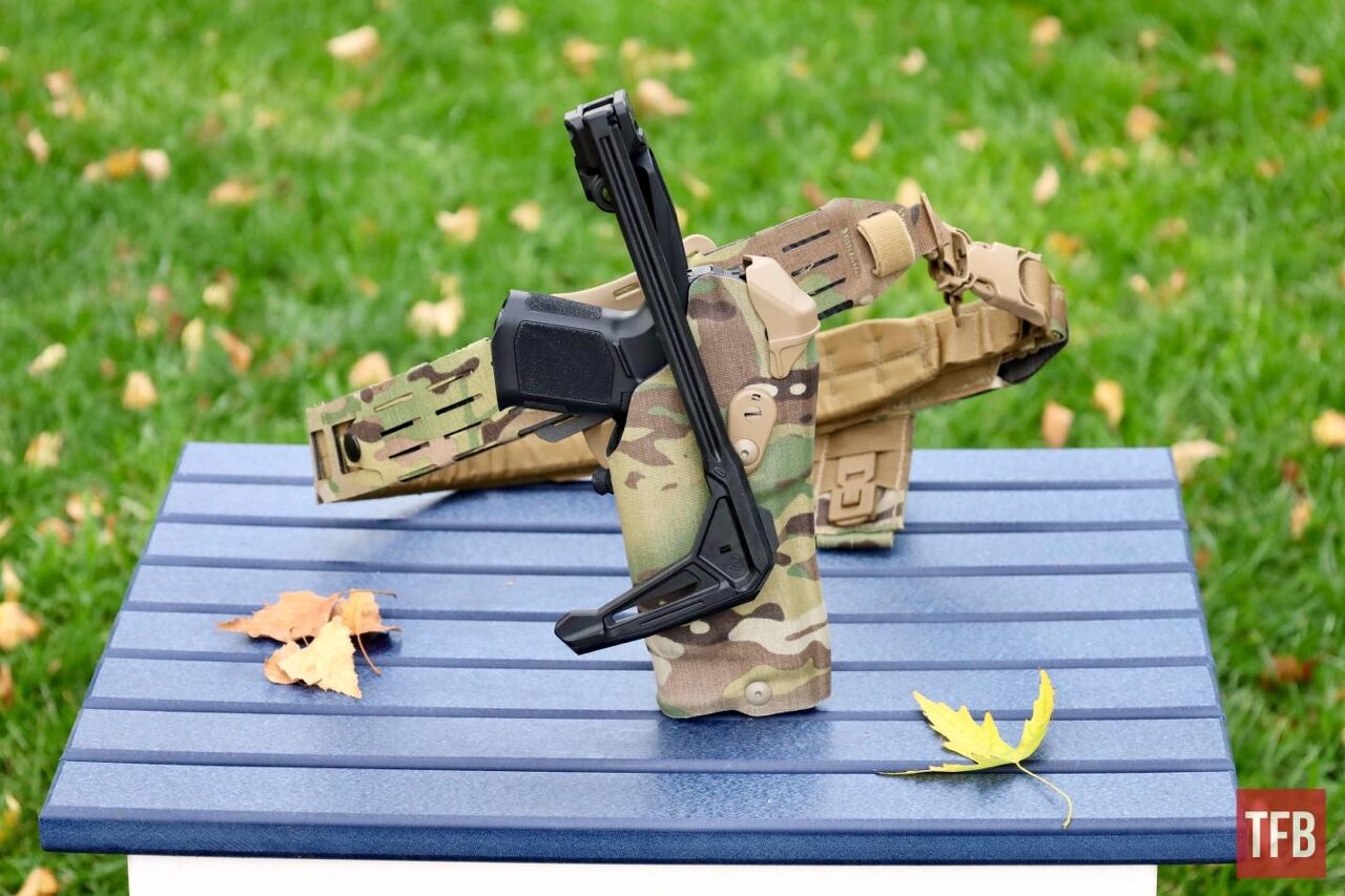 new strike industries fsa lite stab brace and stock, The FSA Lite Stab folded neatly away next to a Safariland ASL Holster